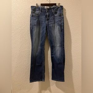 R.E.A.L. Mid Rise Stretch Entwined Boot Cut Jean